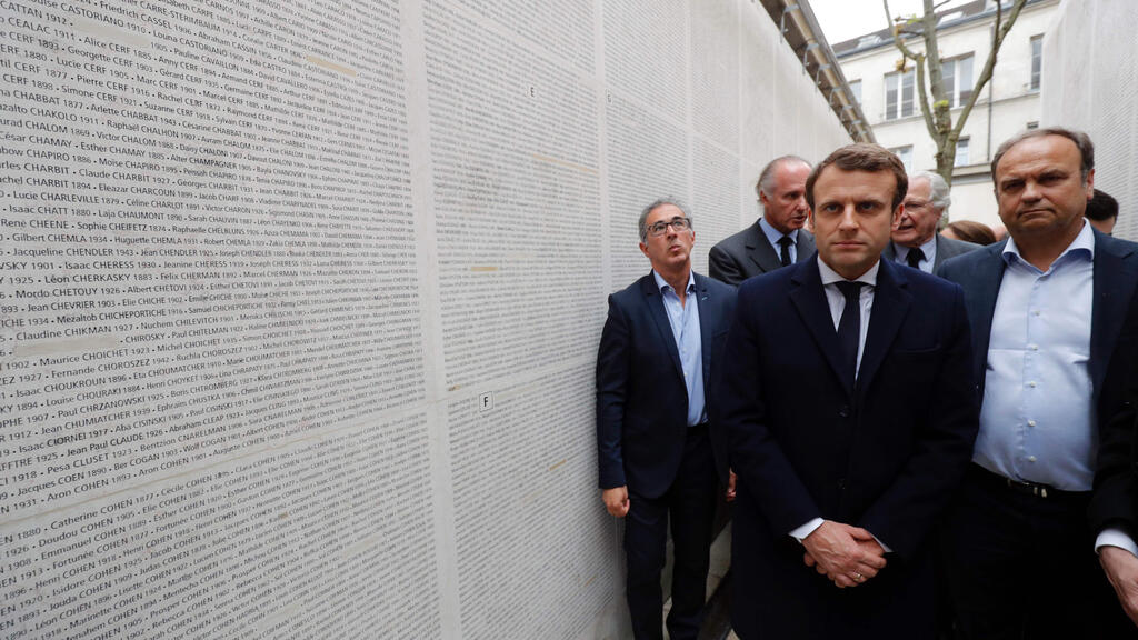 French President Emmanuel Macron visits Holocaust memorial in Berlin

