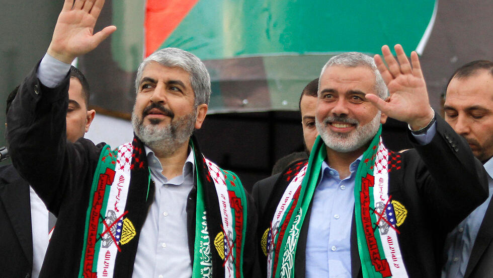 Senior Hamas members Khaled Mashal and Ismail Haniyeh 