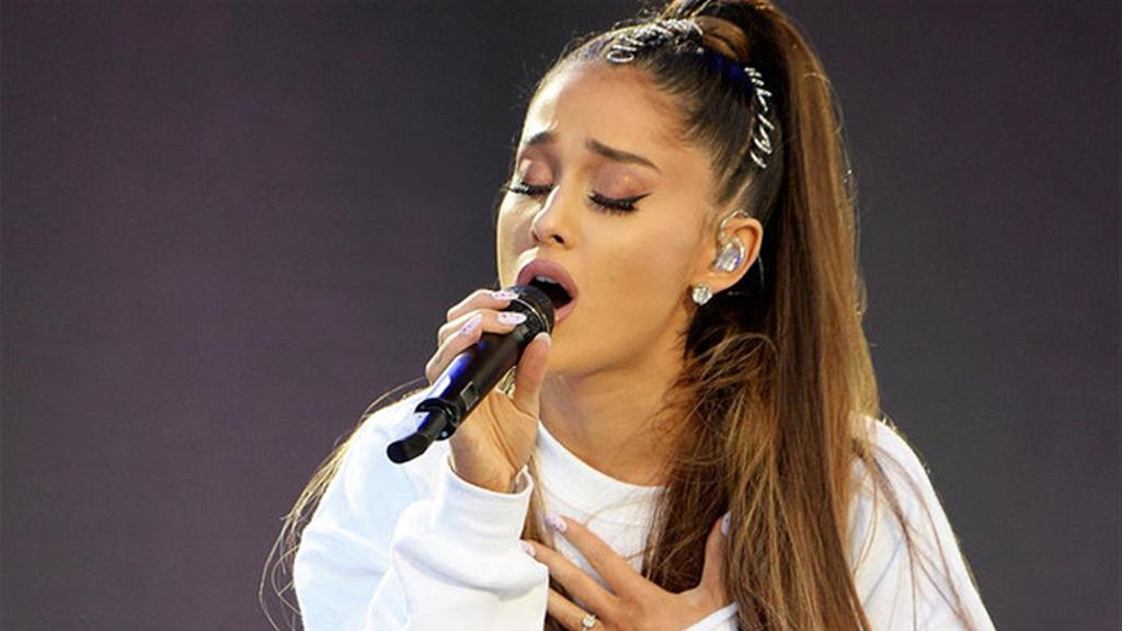 Ariana Grande performs in Manchester two weeks after a bombing attack on her during her concert 