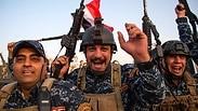 חיילים עיראקים חוגגים את כיבוש מוסול מידי דאעש               