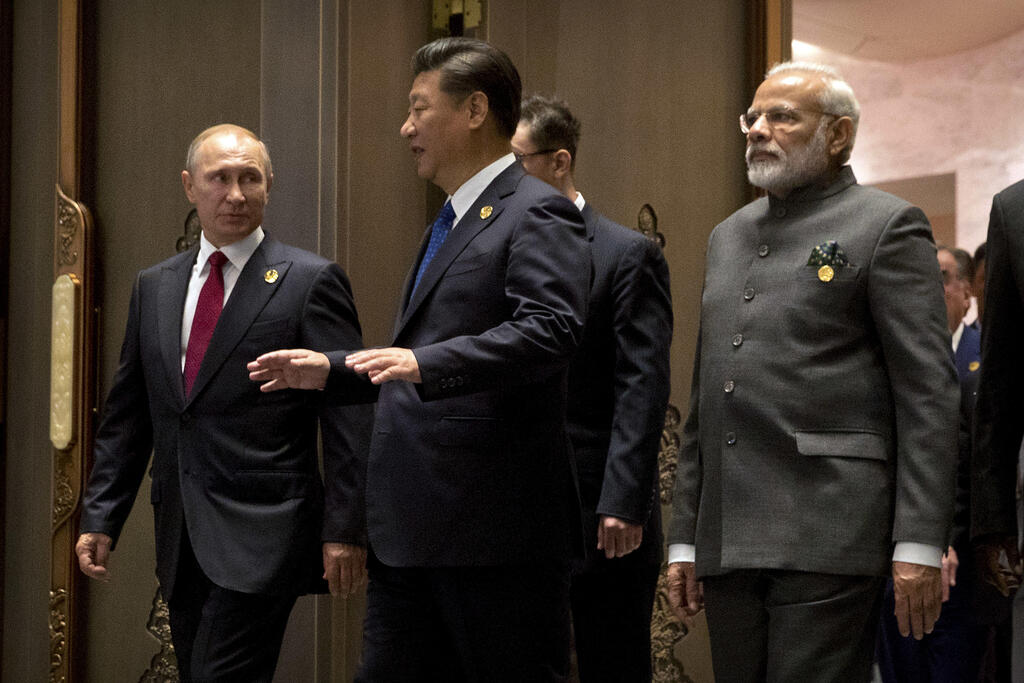 Putin, Jinping, and Modi 