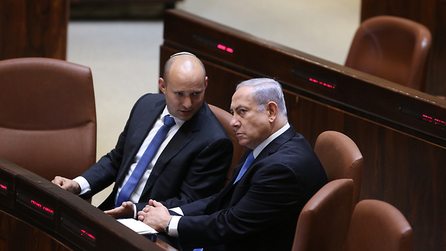 Former allies Naftali Bennett and Benjamin Netanyahu in the Knesset 