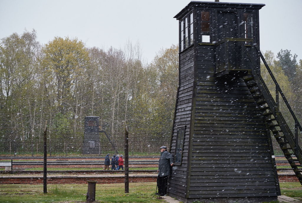Barbed wire fence and a watchtower are seen at the former Nazi Death Camp Stutthof, in Sztutowo, Poland 