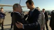 פוטין ואסד בבסיס הרוסי חמיימים בסוריה                   