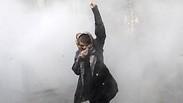 מפגינה נגד המשטר האיראני             