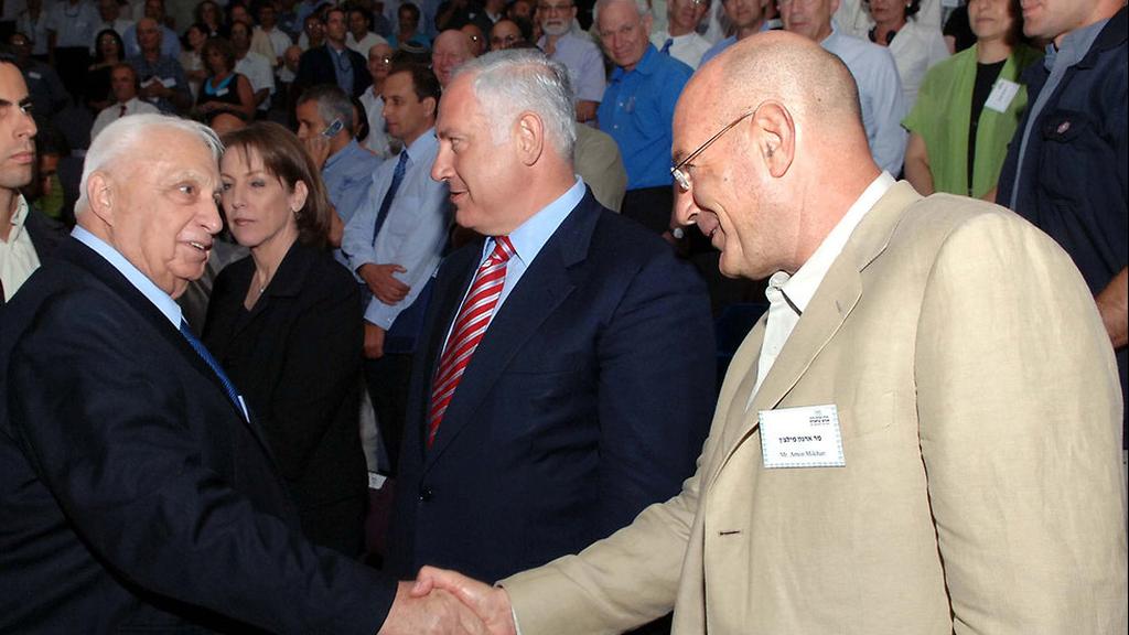 L-R: Then prime minister Ariel Sharon, Benjamin Netanyahu and Arnon Milchan 