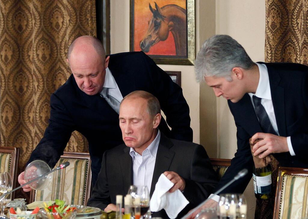 Prigozhin and Putin in better days 