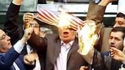 שריפת דגל ארה"ב בפרלמנט האיראני בעקבות פרישת ארה"ב מהסכם הגרעין