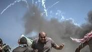 מפגינים פלסטינים רצועת עזה גדר עימותים עם צה"ל ישראל 