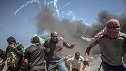 מפגינים פלסטינים רצועת עזה גדר עימותים עם צה"ל ישראל 
