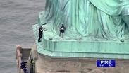 אישה טיפסה על פסל החירות בניו יורק