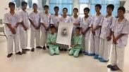 תאילנד נערים לכודים חילוץ טקס זיכרון כבוד צוללן שנהרג סמאן קונאן