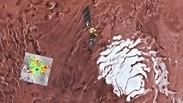דמיה של הלוויין Mars Express סורק את אזור המחקר (בריבוע)
