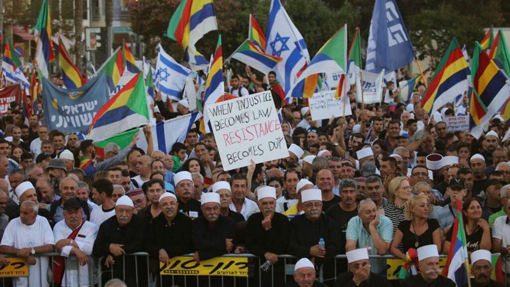 Members of Israel's Druze community protest in Tel Aviv against the Nation-State Law 
