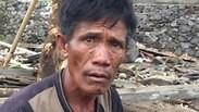 גבר ב אינדונזיה איבד את בנו התינוק ו אימו כשהציל את אשתו ב צונאמי