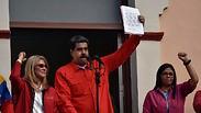 נשיא ונצואלה ניקולאס מדורו  עם אשתו וסגן הנשיא מול קהל ב קראקס