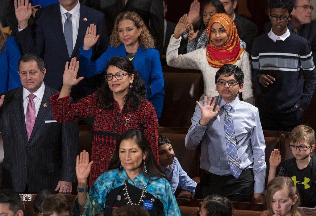 Rep. Rashida Tlaib wears a Palestinian thobe as she is takes her oath on the opening day of the 116th Congress