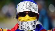 ונצואלה עימותים שיירת סיוע הפגנה בעד חואן גוואידו קראקס