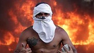 תומכי חואן גוואידו ב קראקס ונצואלה עימותים ניסיון הפיכה