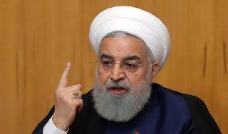  נשיא איראן חסן רוחאני בועידה ממשלתית בטהרן בה החזיר על החלטת המדינה להקטין את מימוש התחייבויותיהם בהסכם הגרעין