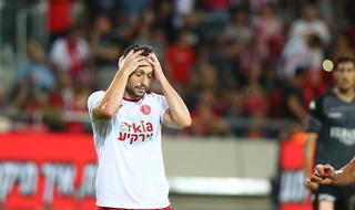 אלטמן תופס את הראש