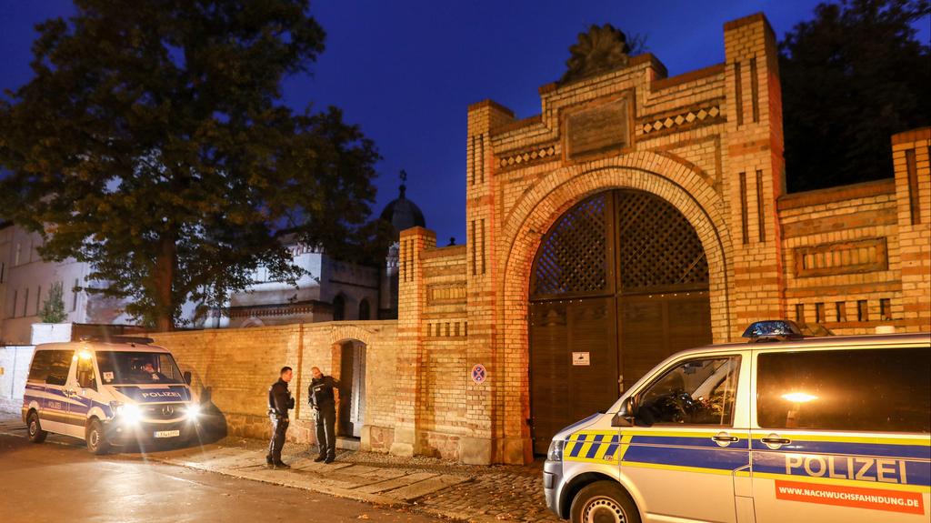 German police officers stand in front of the synagogue in Halle attacked by a heavily armed perpetrator on Yom Kippur, Oct. 9, 2019 