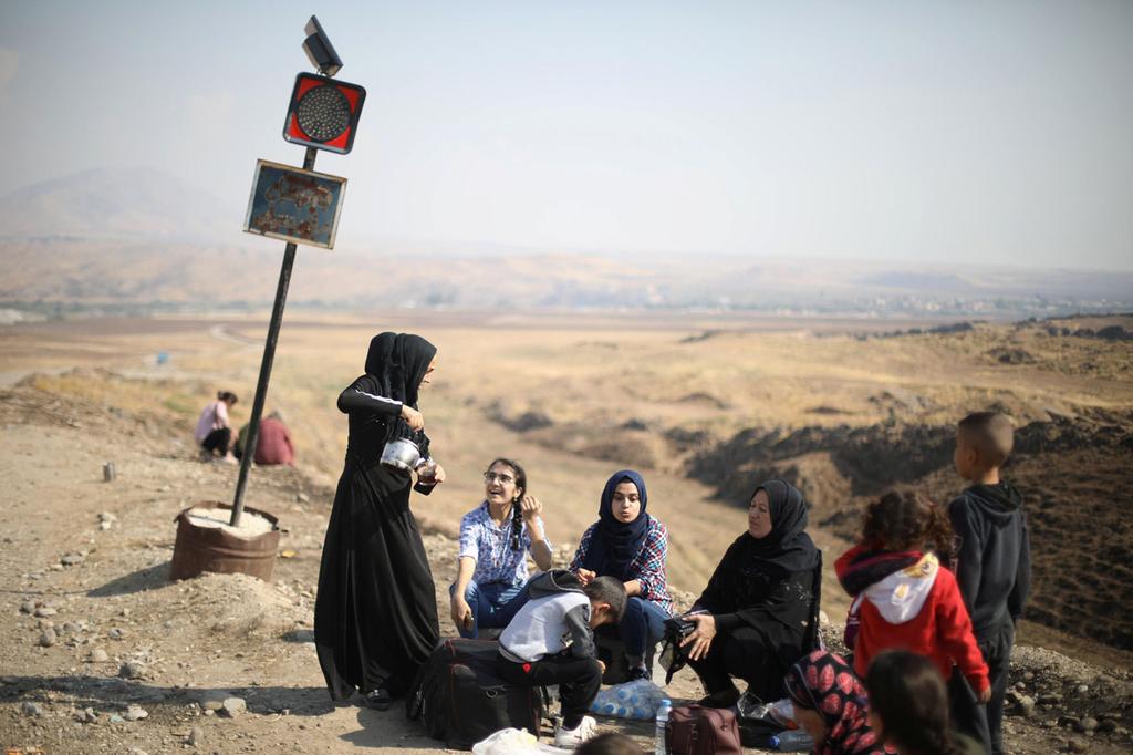 סוריה פליטים כורדים מנסים לחצות את הגבול ל עיראק מבצע של טורקיה