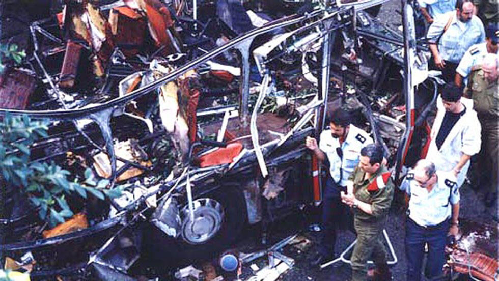  Aftermath of a suicide bombing of a Tel Aviv bus in 1994 