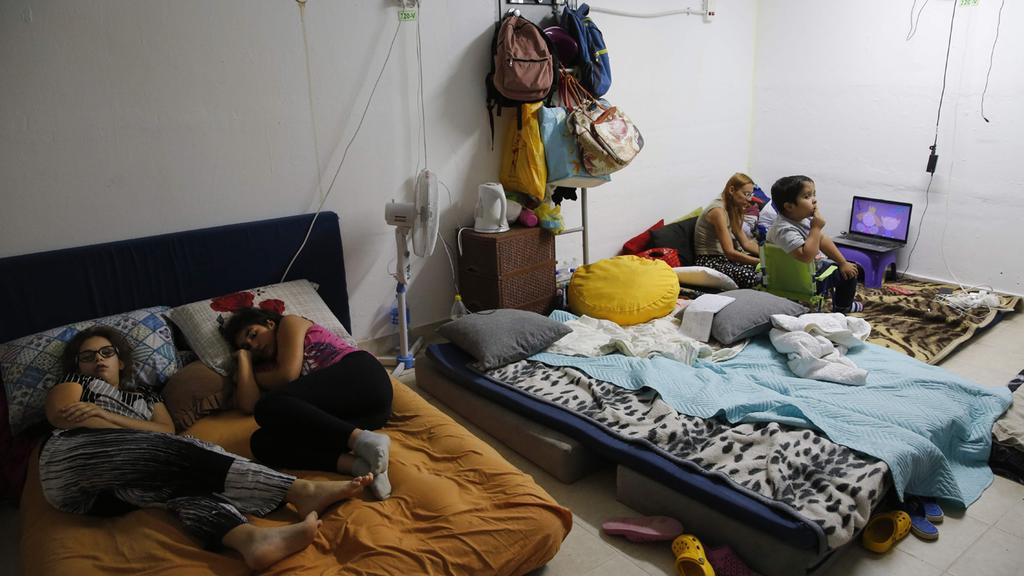 Israeli children near the Gaza border turn their bomb shelter into a bedroom 