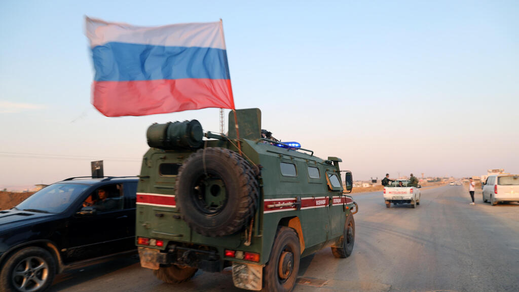 Russian military police forces patrol an area at Qamishli, northern Syria, Oct. 26 2019 