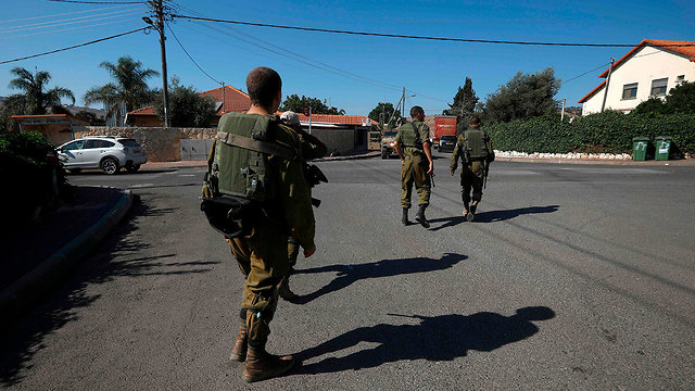 IDF troops at Moshav Avivim on the northern border