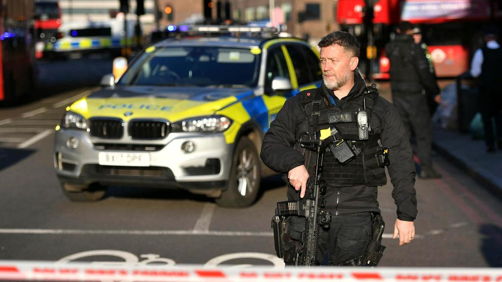  An armed police officer on London Bridge following a stabbing that left several wounded 