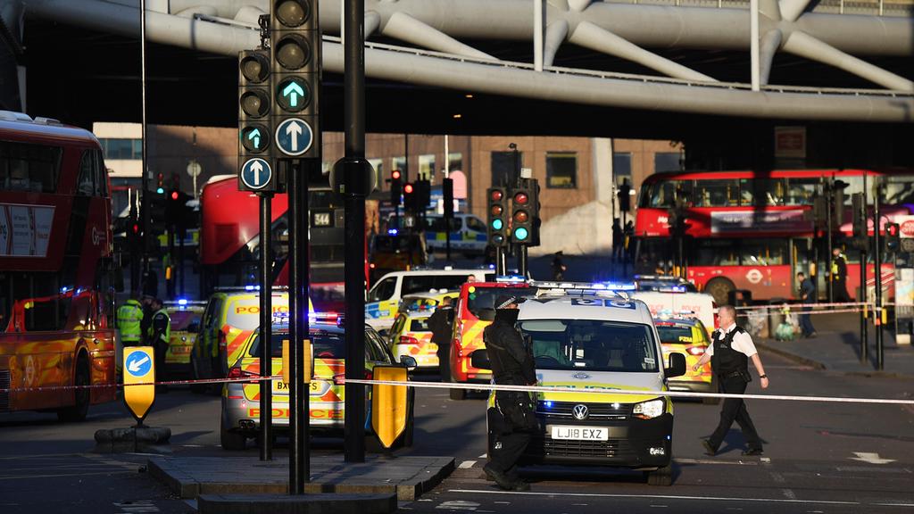  Police officers at the scene of the incident on London Bridge 