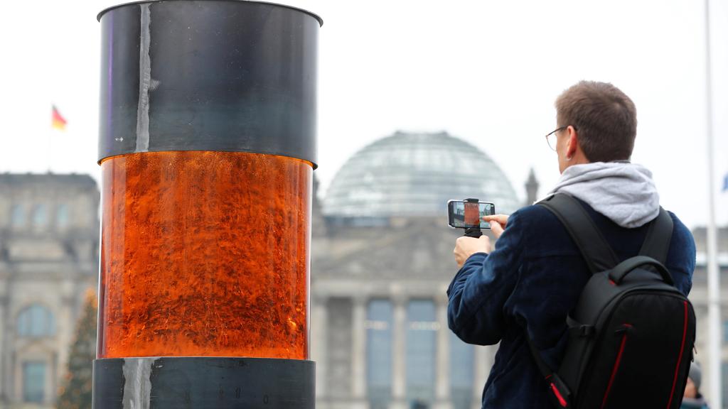 Urn placed in front of the German parliament that those behind it claim contains Holocaust victims