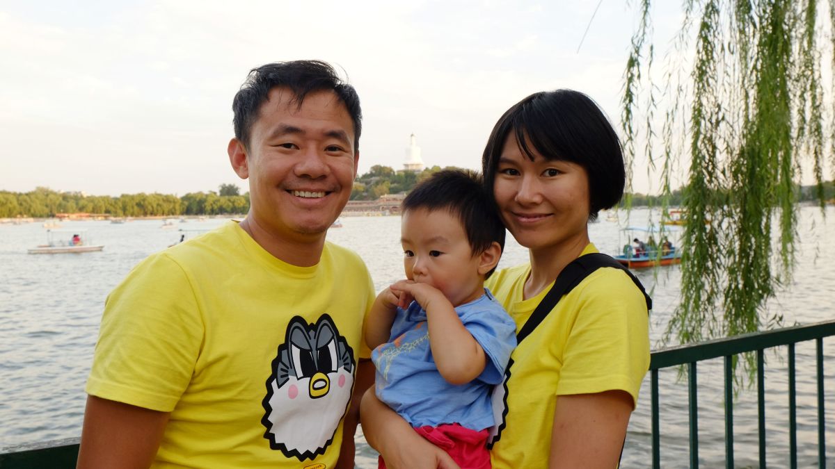 Xiyue Wang and his wife and son