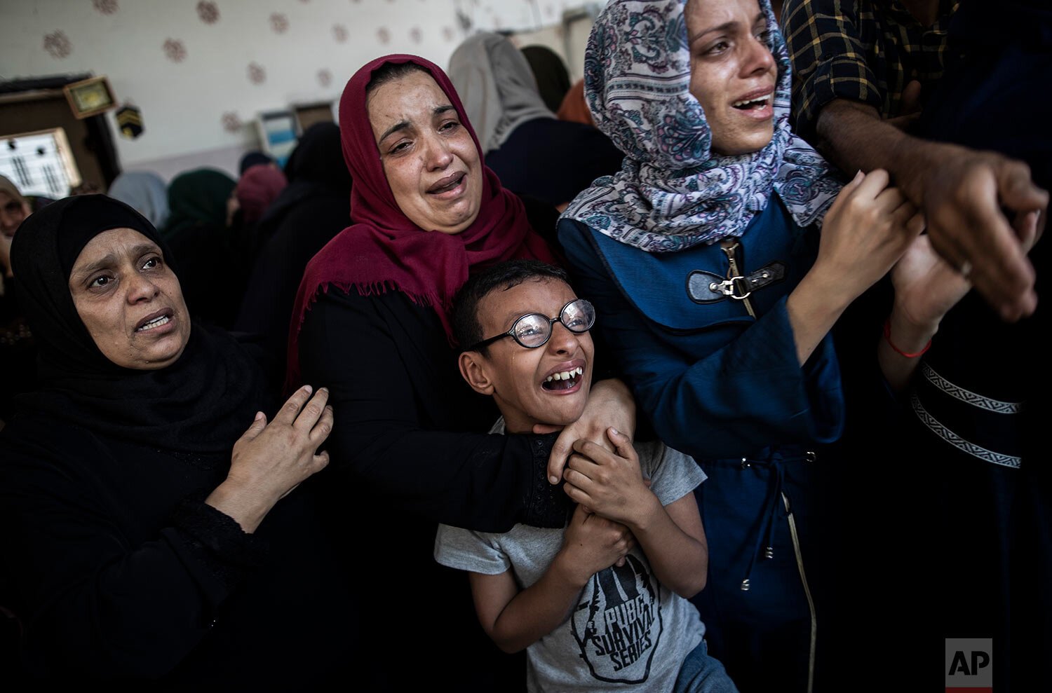 Relatives mourn the death of Palestinian Hamas militant Mohammad Abu Namous, 27, in the family home during his funeral in the Jabaliya refugee camp, northern Gaza Strip 