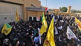 עיראק אנשי ו תומכי מיליציות פרו איראניות דיווח הסתערות שגרירות ארה"ב בגדד