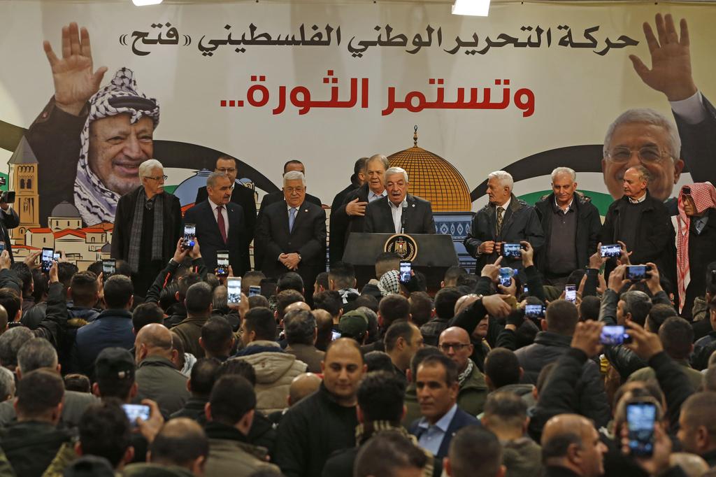 Palestinian President Mahmoud Abbas attends a ceremony marking the 55th foundation anniversary of the Fatah movement in the West Bank city of Ramallah. Dec. 31, 2019 