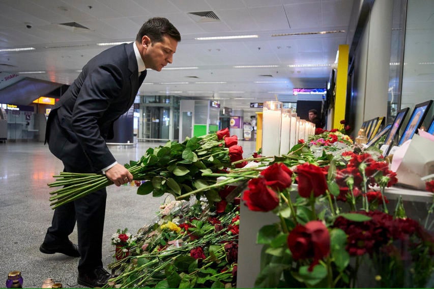 Ukrainian President Volodymyr Zelensky lays flowers in memory of passangers and crew of downed airliner