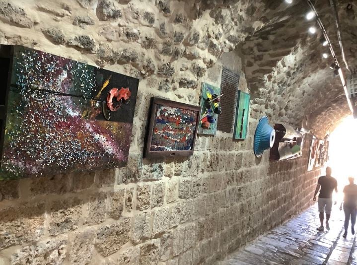 An alleyway turned into an art gallery in old Akko 