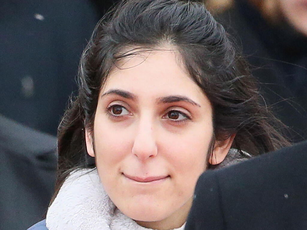 נעמה יששכר עולה על המטוס חזרה לישראל לאחר שחרורה מהכלא ברוסיה