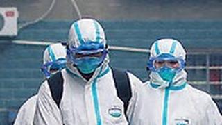 צוותי חיטוי ברחובות ג'ג'יאנג