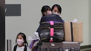 נוסעים טיסה שדה תעופה אוסטרליה נגיף וירוס קורונה ווהאן סין