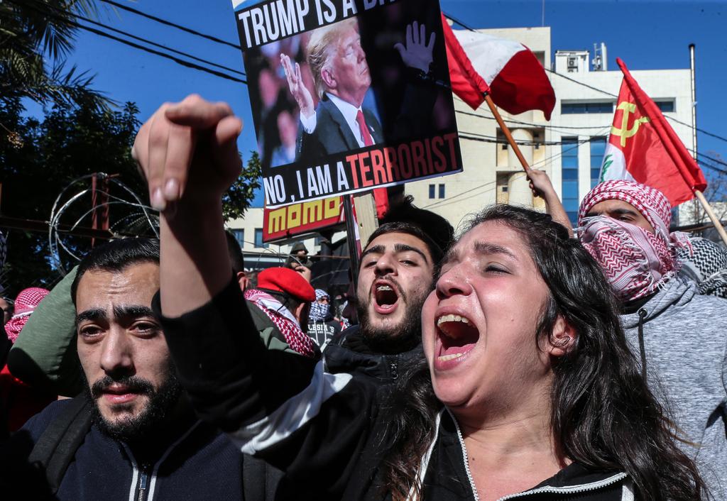Lebanese demonstrators protest the so-called 'Deal of the Century' next to the U.S. Embassy at Awkar north of Beirut, Lebanon 