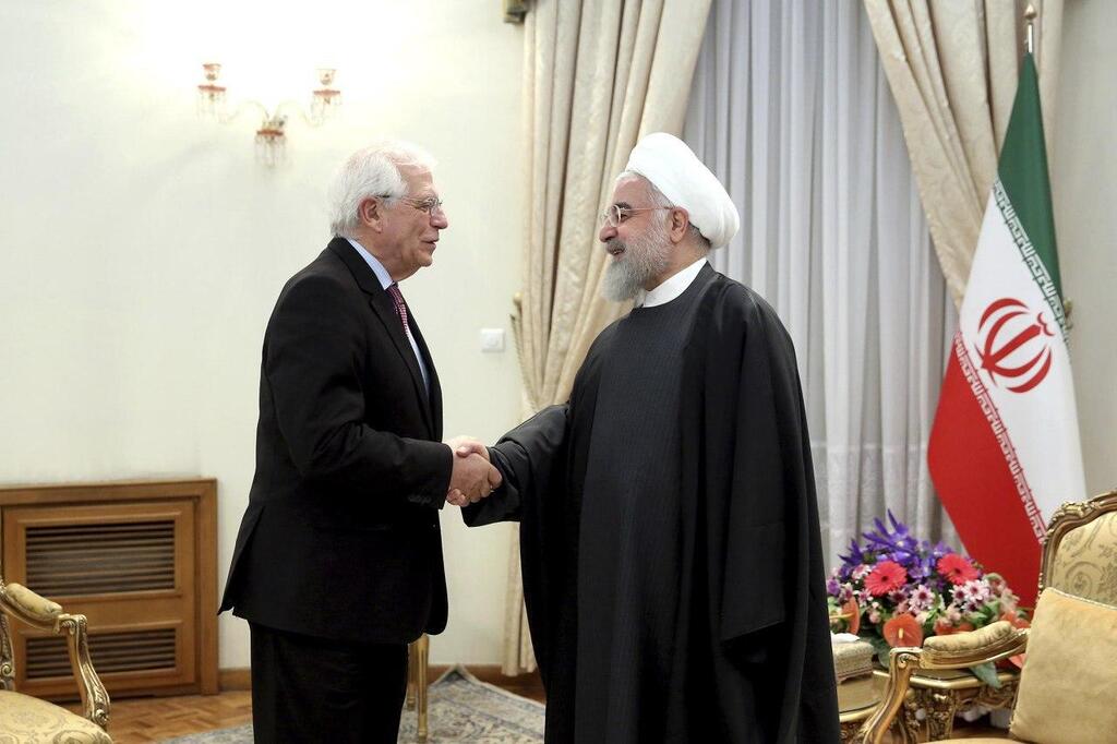 שר החוץ של האיחוד האירופי ג'וזל בורל עם נשיא איראן חסן רוחאני