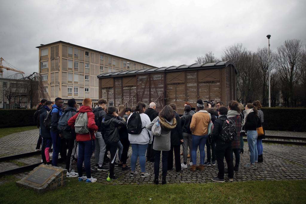 Students attend a workshop dedicated to the Holocaust remembrance at the Drancy Shoah memorial, outside Paris, Jan. 30, 2020 