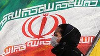 איראן אישה עם מסכה ב טהרן 12 בפברואר מחשש לנגיף וירוס קורונה