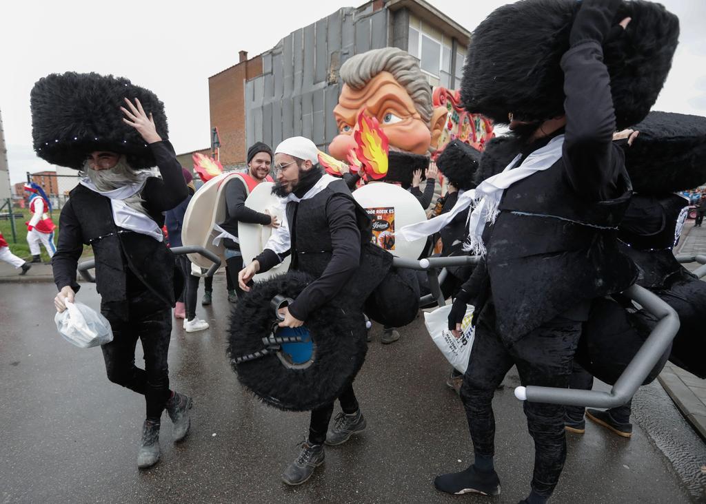 People portray Hassidic Jews as ants at the parade in Aalst, Feb. 23 2020 