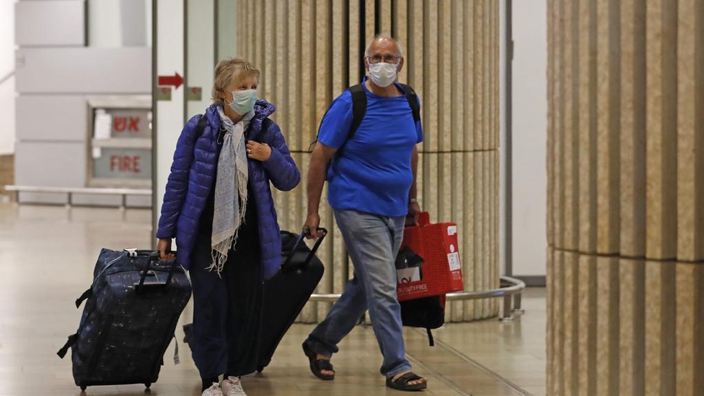  Passengers arriving at Ben Gurion Airport during the coronavirus pandemic 