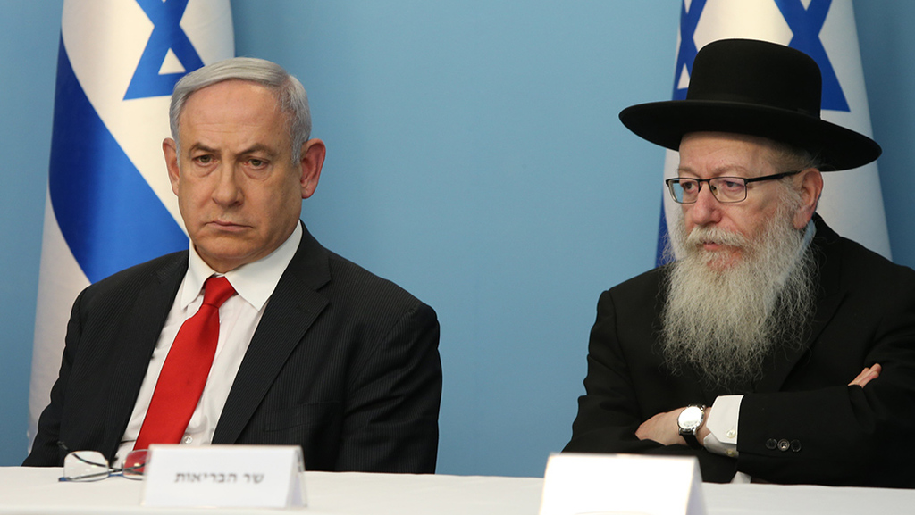 Prime Minister Benjamin Netanyahu and former health minister Yaakov Litzman of United Torah Judaism 
